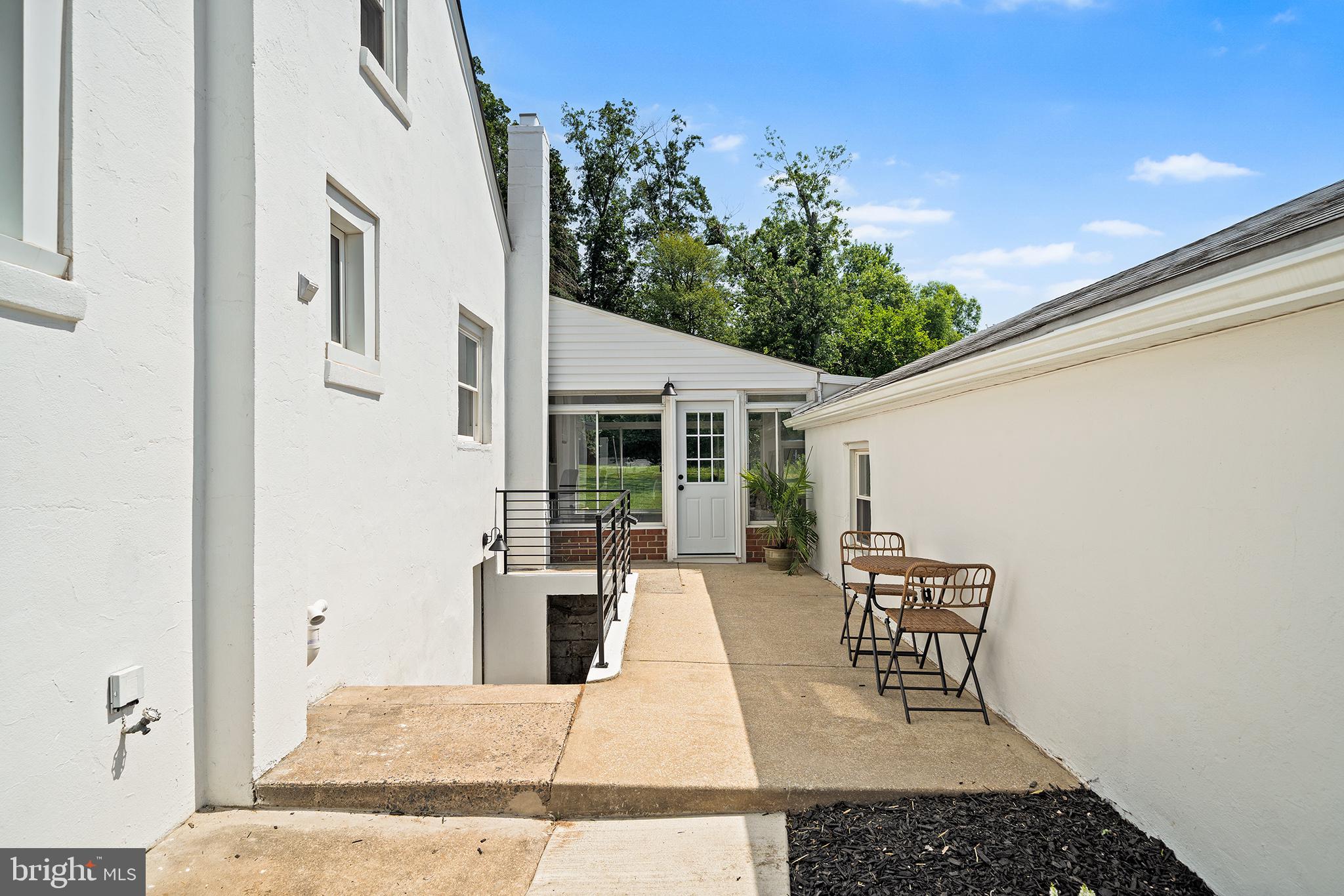 1708 Gallagher Road Plymouth Meeting, PA 19462 - Photo 3 of 37 a view of a patio with table and chairs and potted plants
