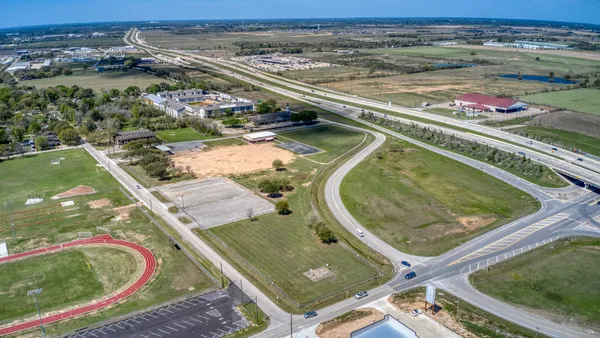 an aerial view of a pool