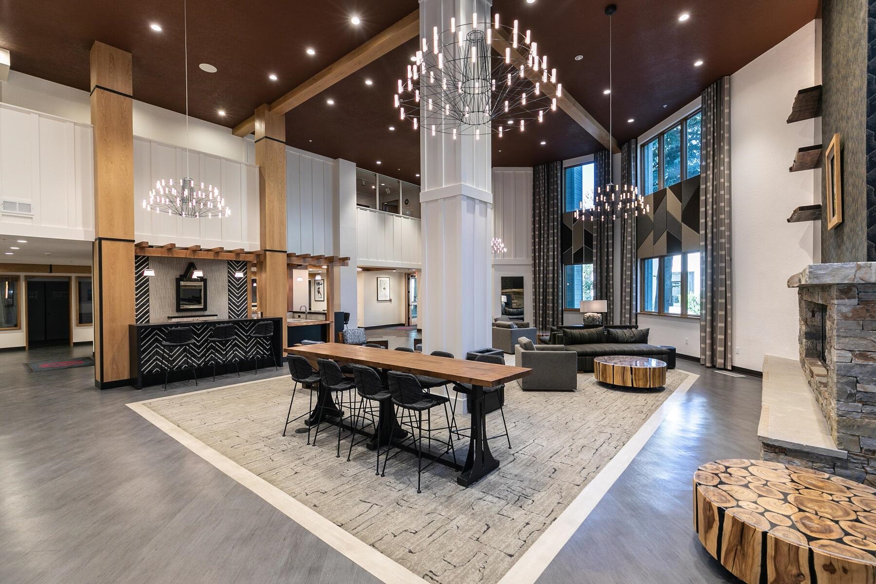 201 Shirley Cyn Road, Unit 311 Olympic Valley, CA 96146 - Photo 19 of 28 a living room with furniture and kitchen view