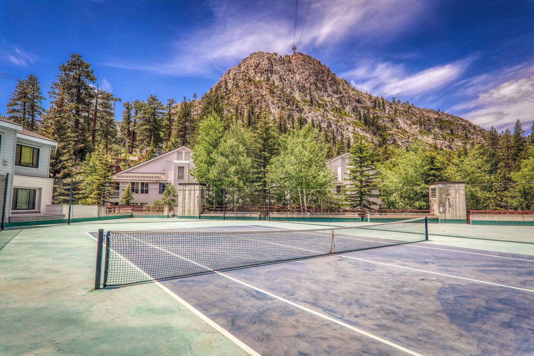 201 Shirley Cyn Road, Unit 311 Olympic Valley, CA 96146 - Photo 23 of 28 a view of a house with a yard