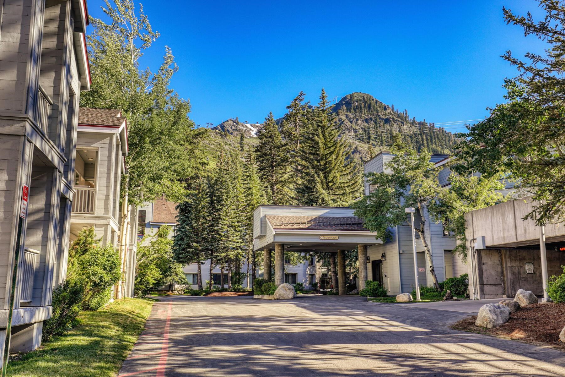 201 Shirley Cyn Road, Unit 311 Olympic Valley, CA 96146 - Photo 27 of 28 a front view of a house with a yard