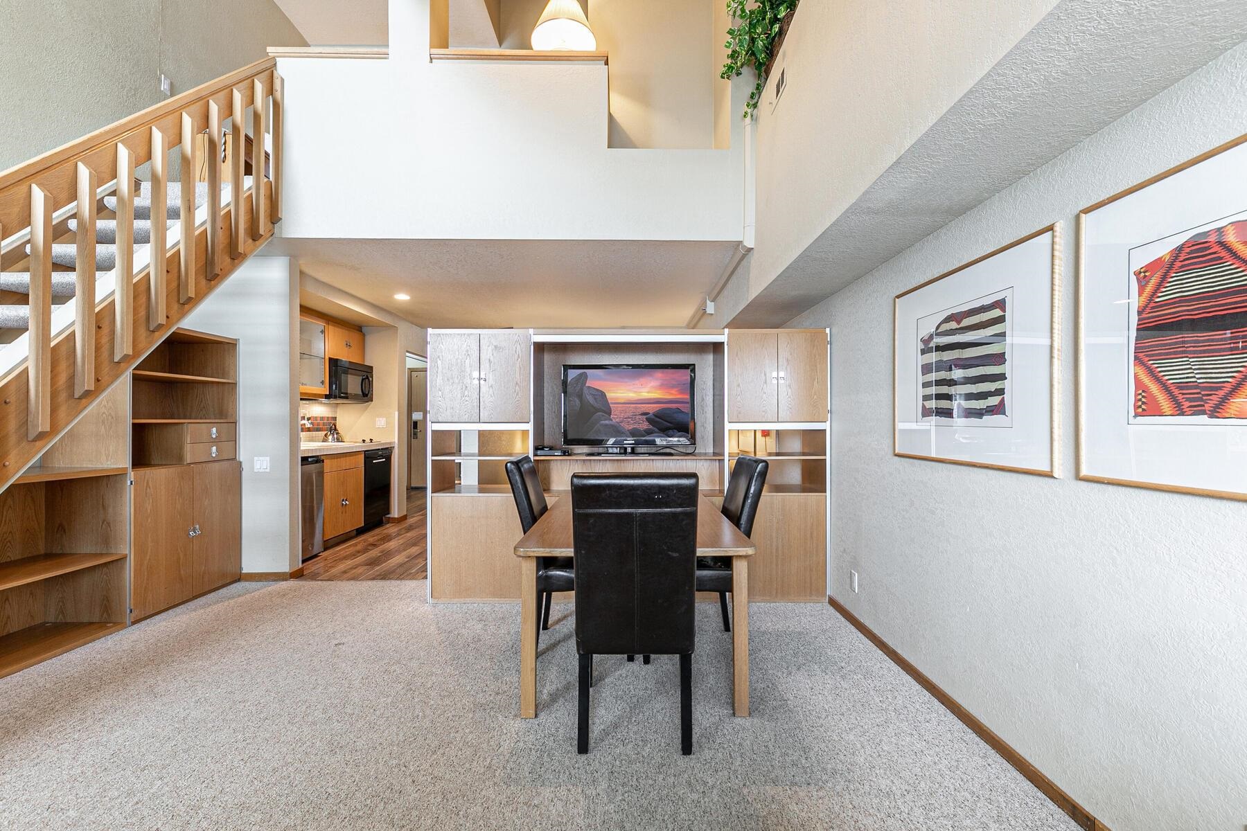 201 Shirley Cyn Road, Unit 311 Olympic Valley, CA 96146 - Photo 3 of 28 a view of a dining room with furniture