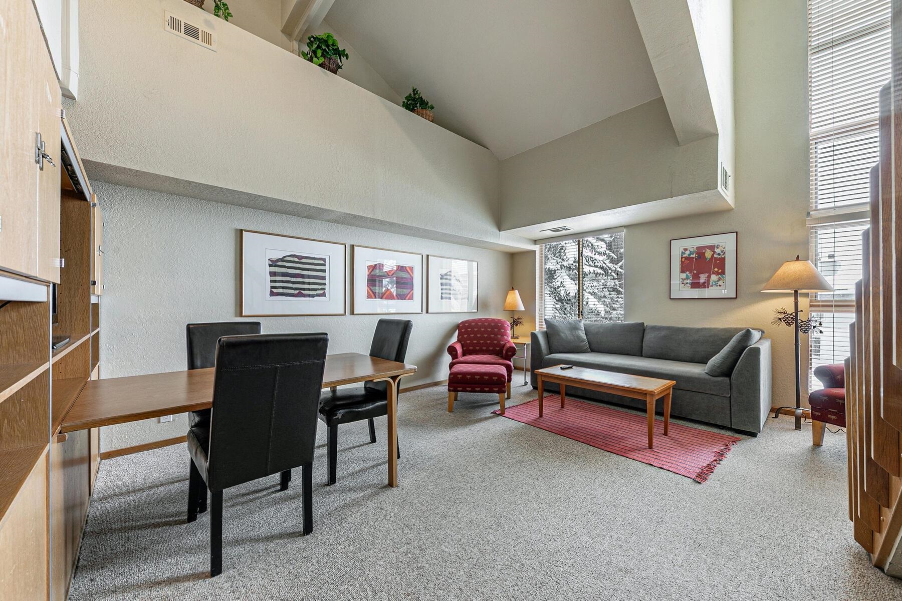 201 Shirley Cyn Road, Unit 311 Olympic Valley, CA 96146 - Photo 7 of 28 a living room with furniture and a window