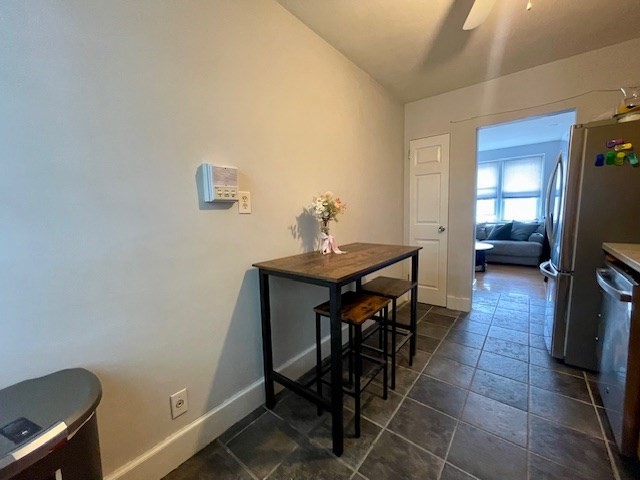 125 Farragut Road, Unit 46 Boston, MA 02127 - Photo 9 of 15 a view of a workspace with furniture and a window