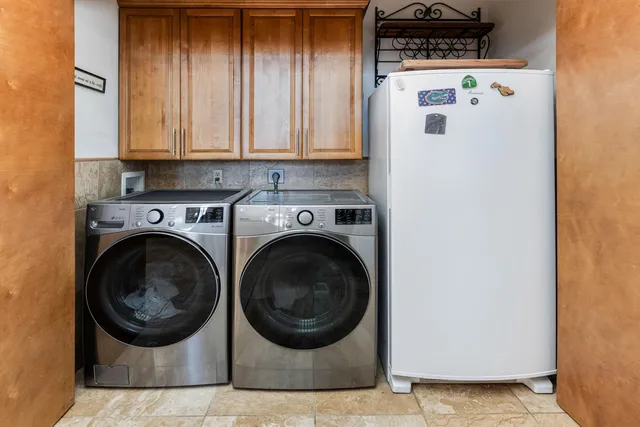 a bathroom with a sink a toilet and a vanity