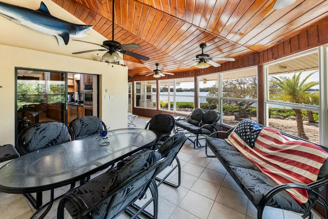 a view of a workspace with furniture