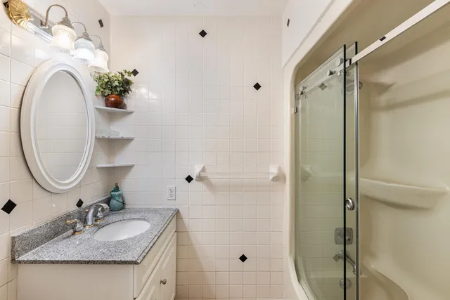 a view of a backyard with sitting area