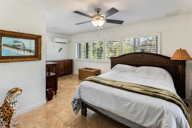 a view of a terrace with wooden floor and iron stairs