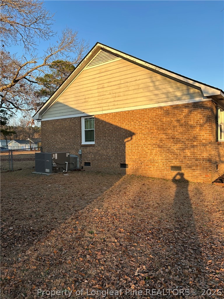 6520 Bagdad Road Fayetteville, NC 28306 - Photo 4 of 6 a view of house with backyard
