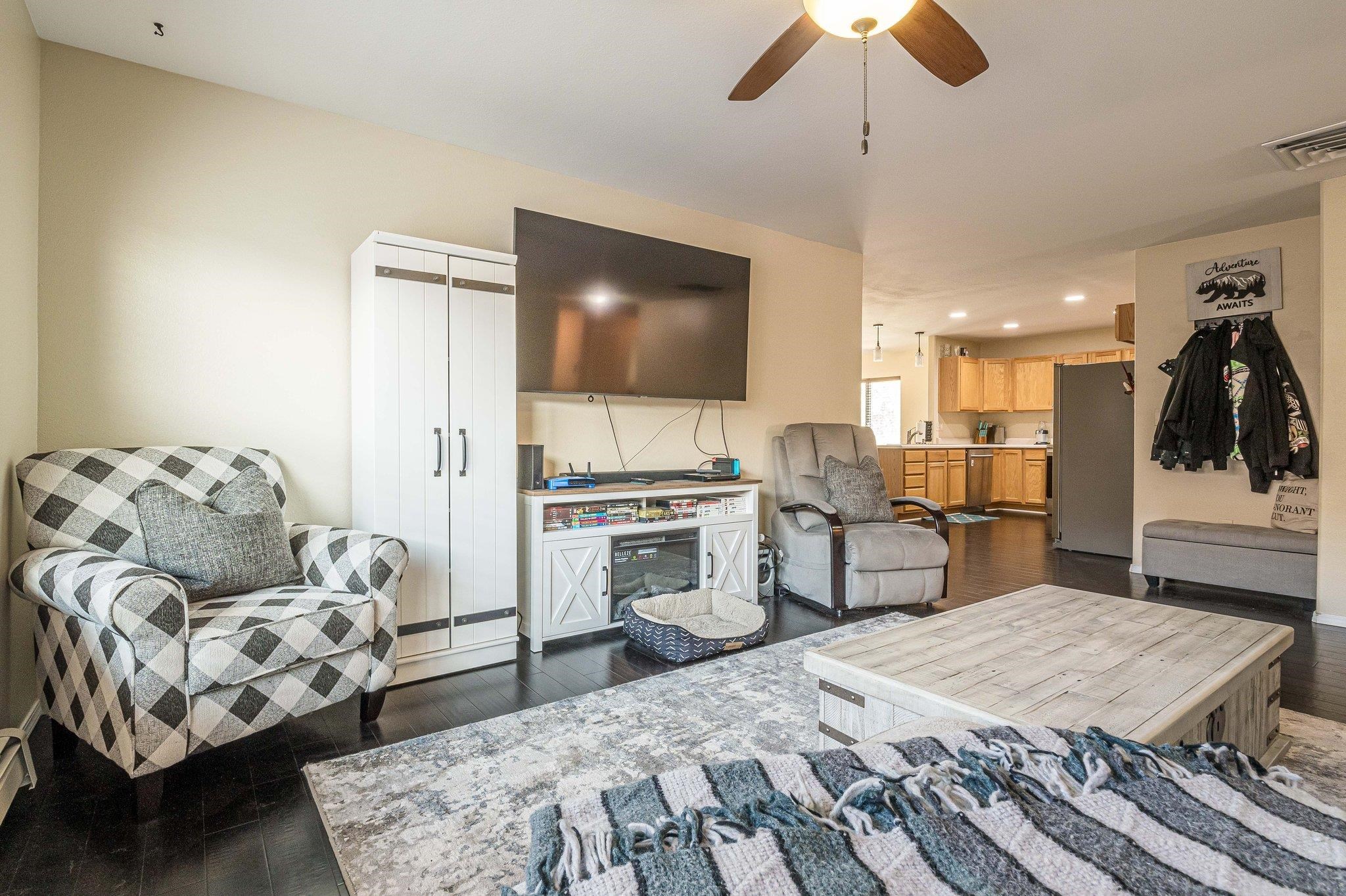 424 1/2 29 1/2 Road Grand Junction, CO 81504 - Photo 12 of 40 a living room with furniture and kitchen view