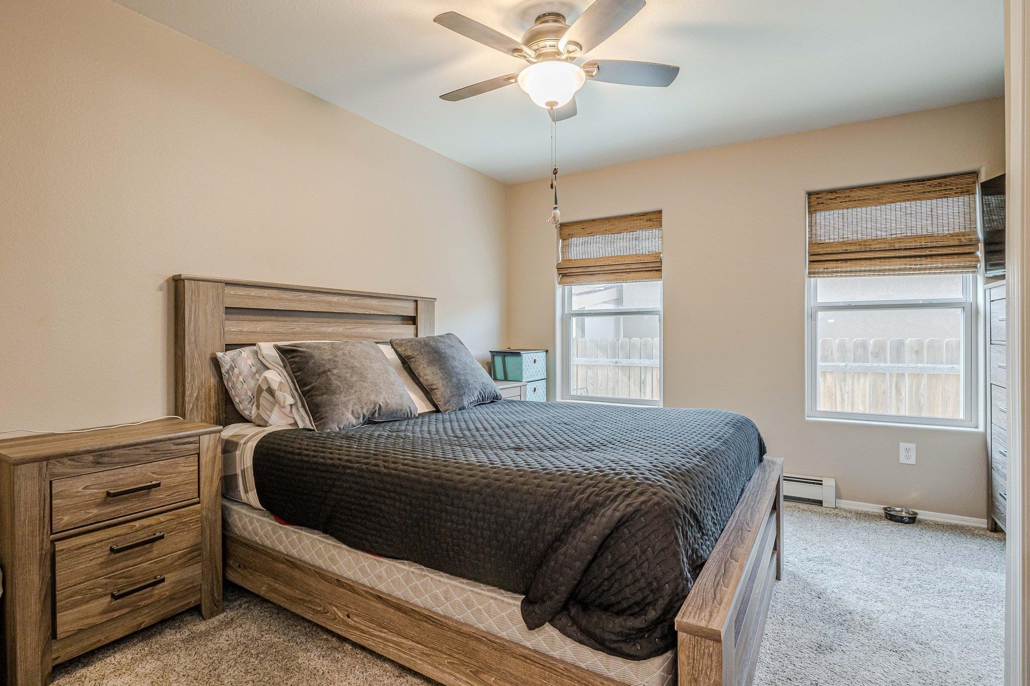 424 1/2 29 1/2 Road Grand Junction, CO 81504 - Photo 23 of 40 a bedroom with a bed and a window