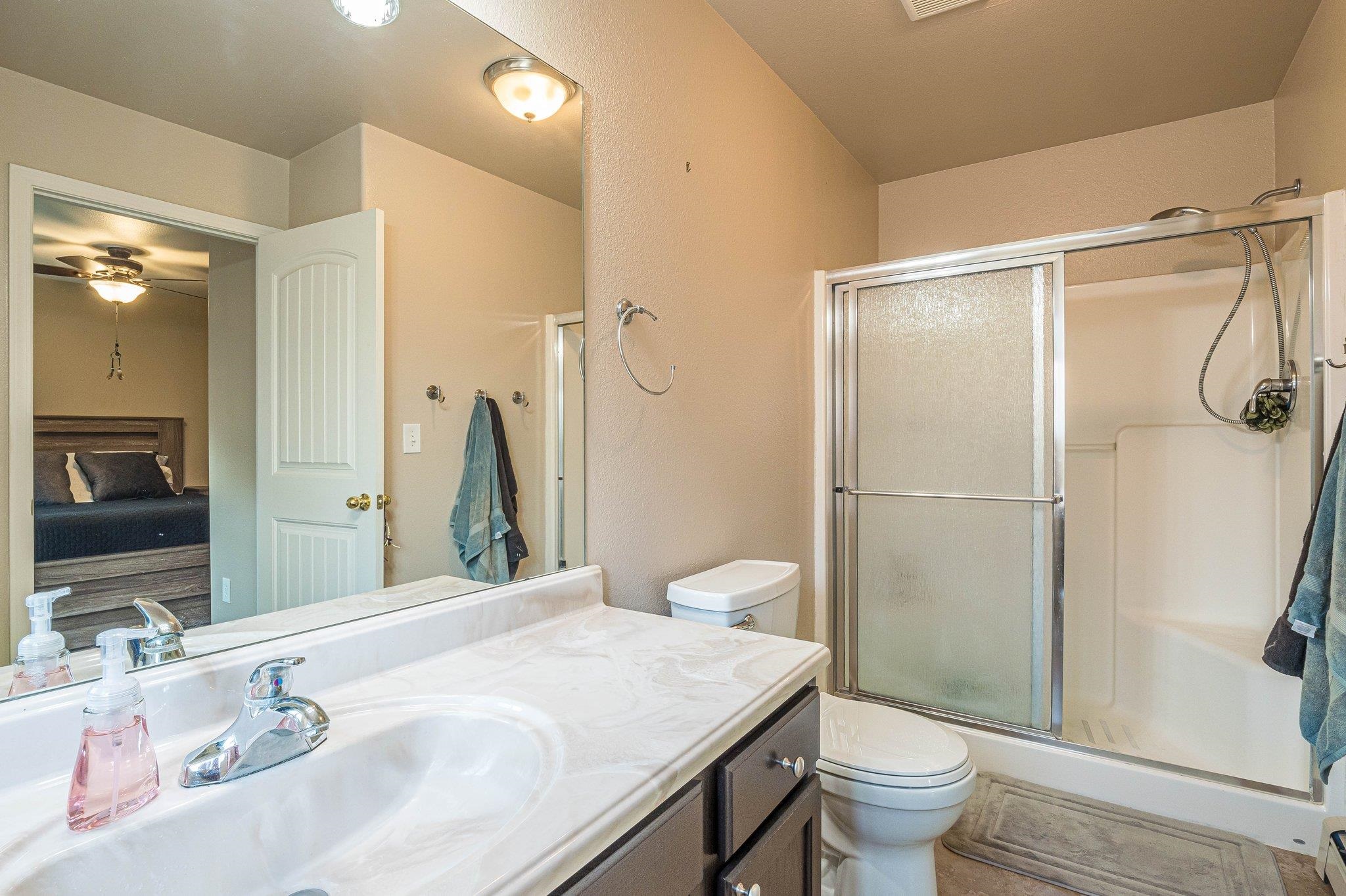 424 1/2 29 1/2 Road Grand Junction, CO 81504 - Photo 28 of 40 a bathroom with a sink toilet and shower
