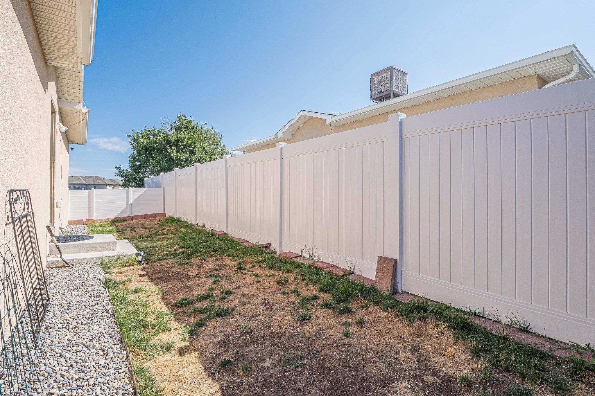 424 1/2 29 1/2 Road Grand Junction, CO 81504 - Photo 32 of 40 a view of a backyard with pathway