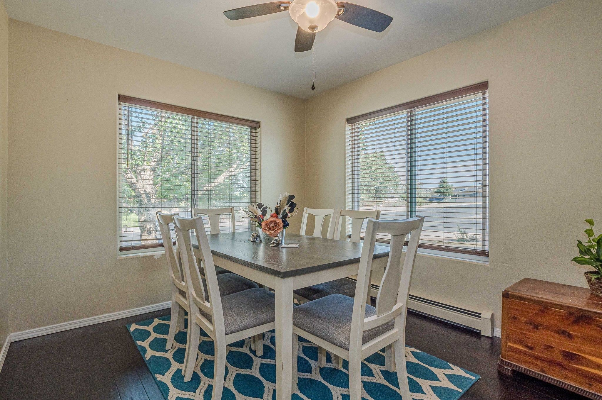 424 1/2 29 1/2 Road Grand Junction, CO 81504 - Photo 4 of 40 a dining room with furniture a chandelier and window