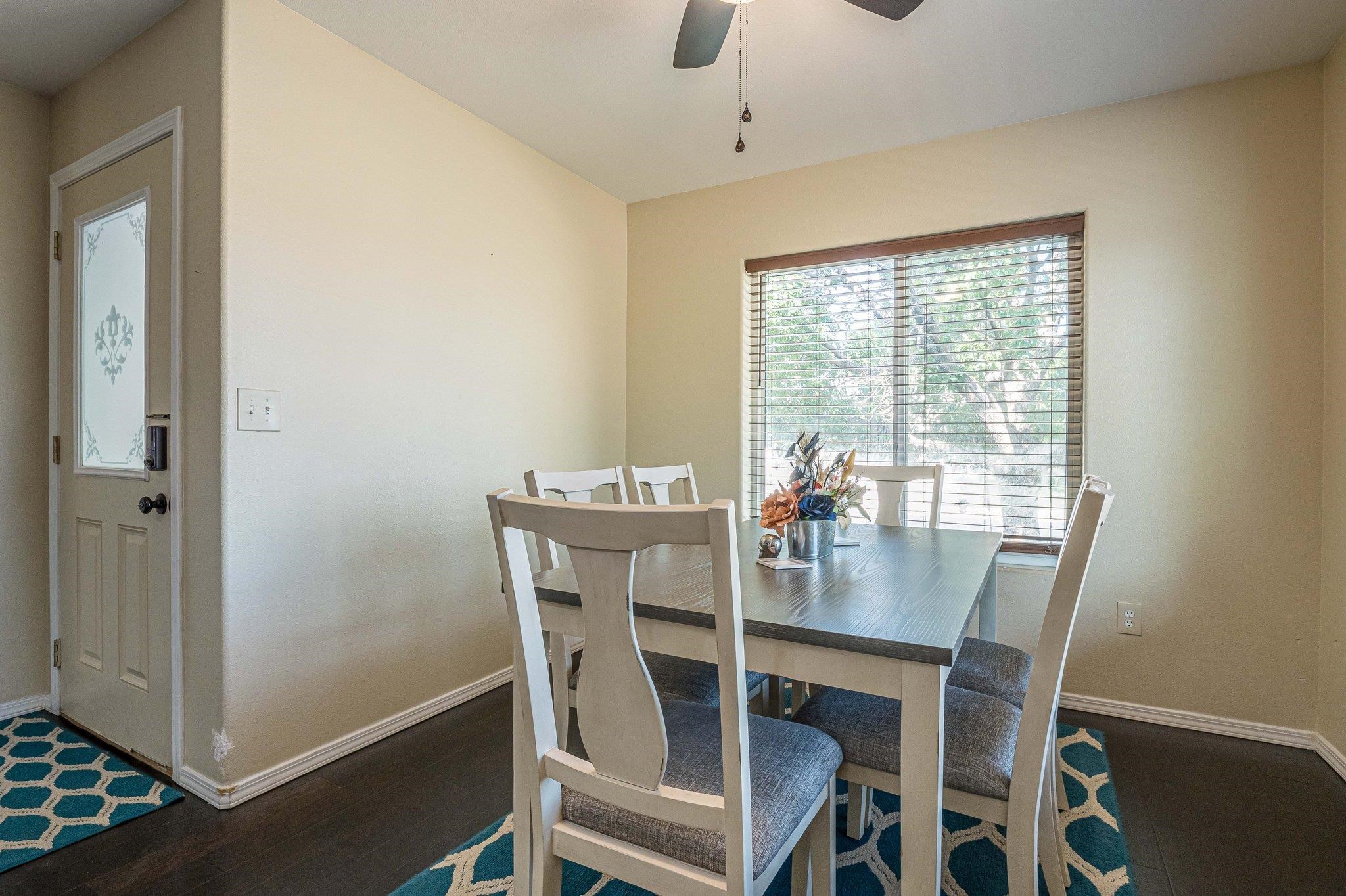 424 1/2 29 1/2 Road Grand Junction, CO 81504 - Photo 5 of 40 a view of a dining room with furniture window and outside view
