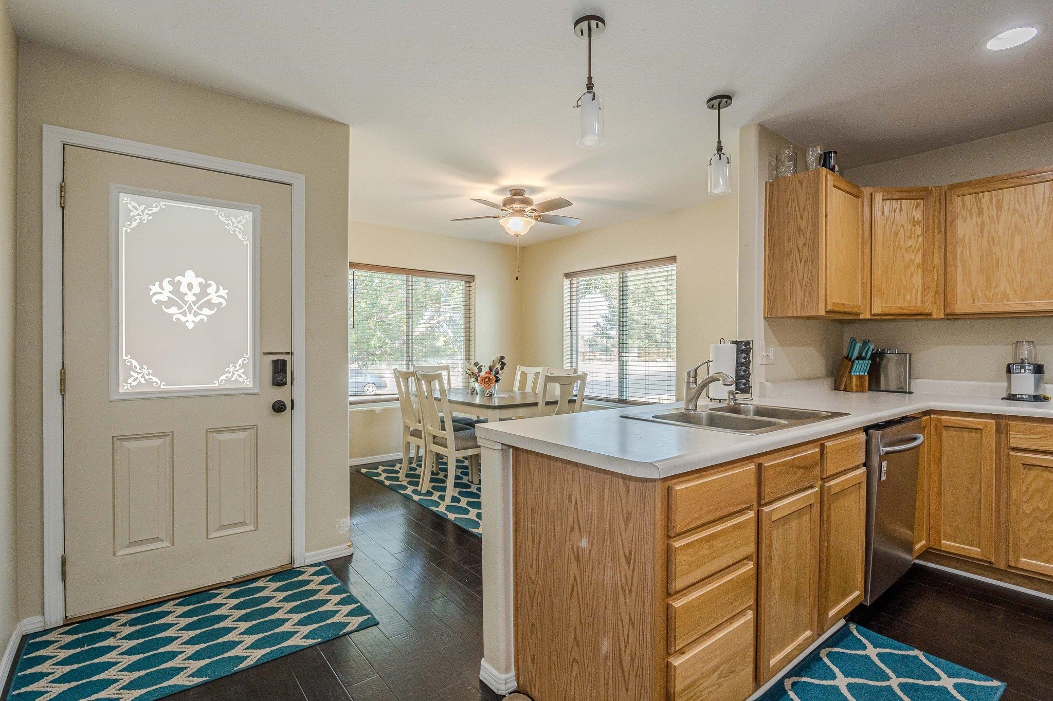 424 1/2 29 1/2 Road Grand Junction, CO 81504 - Photo 7 of 40 a kitchen with sink cabinets and window