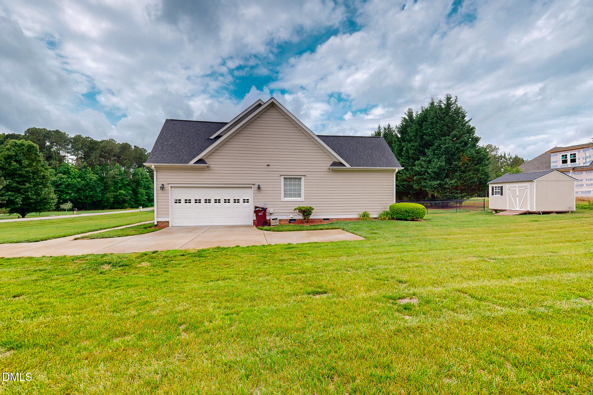 115 Duncan Plantation Road Timberlake, NC 27583 - Photo 20 of 48 a view of a house with a yard
