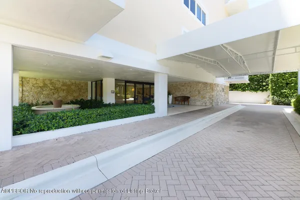 a view of house with patio and outdoor seating