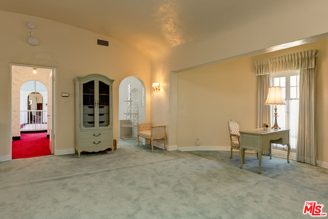 1003 Benedict Canyon Drive Beverly Hills, CA 90210 - Photo 16 of 35 a view of livingroom with furniture