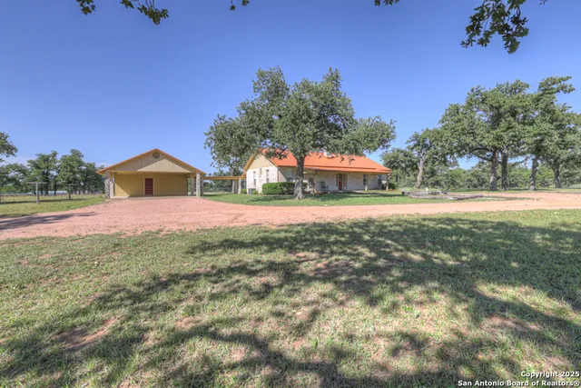 a house with garden in front of it