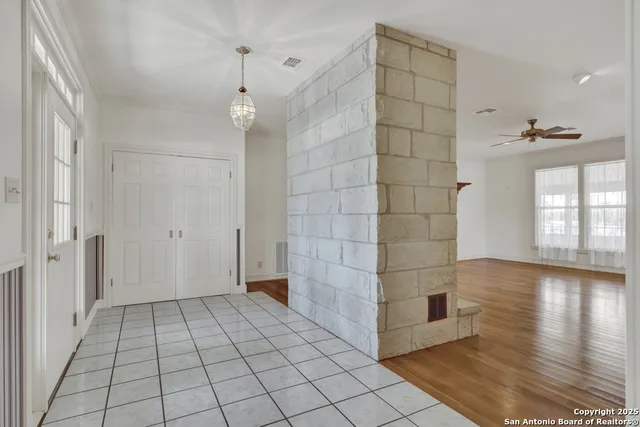 a view of an empty room and window