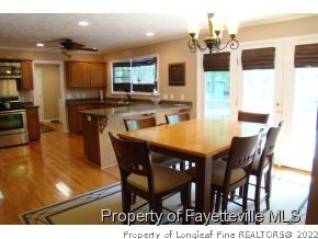 241 Hardy Road Carthage, NC 28327 - Photo 4 of 12 a dining room with furniture and wooden floor