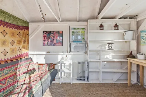 a view of a room with racks on the wall