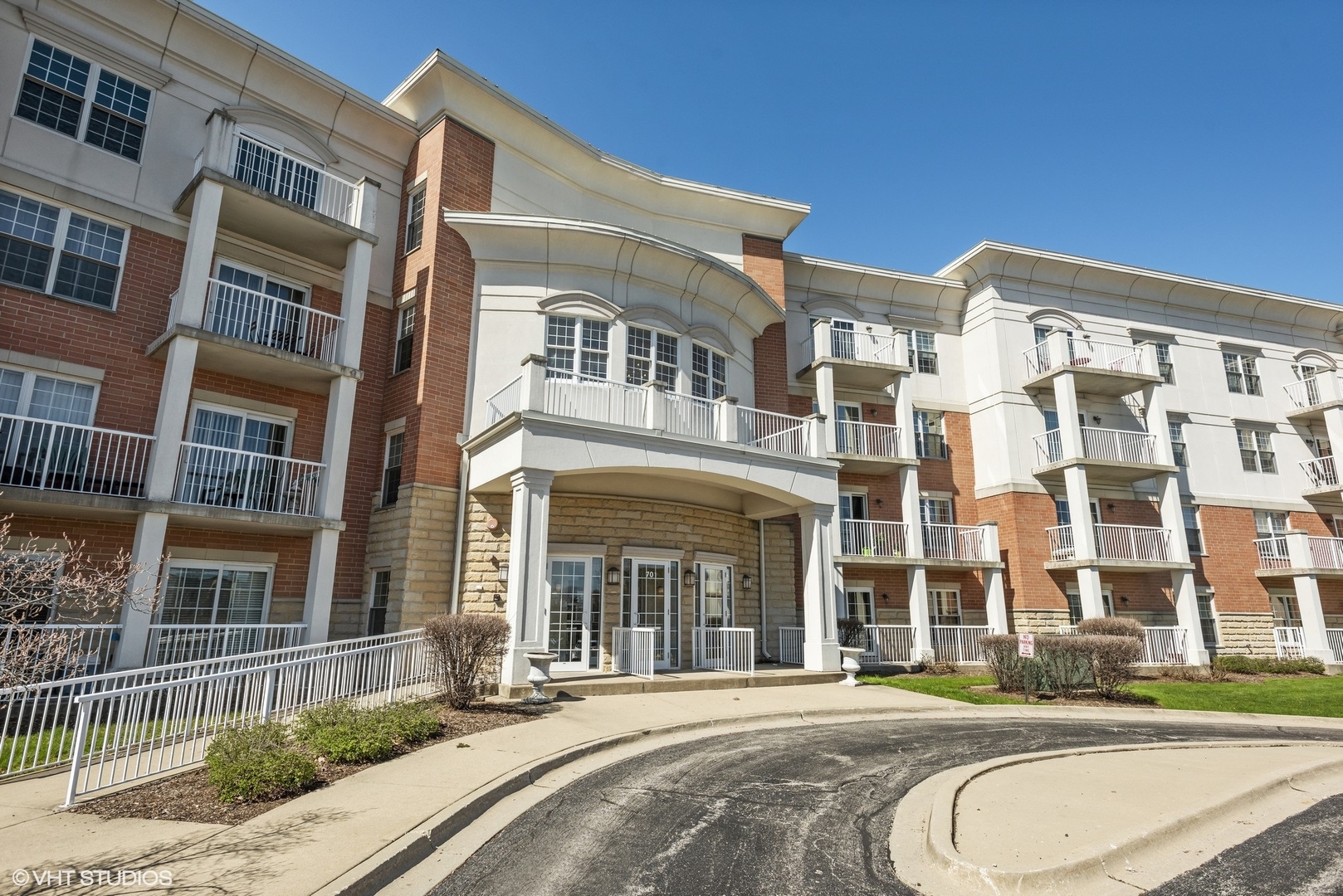 701 West Rand Road, Unit 330 Arlington Heights, IL 60004 - Photo 1 of 16 a front view of a building