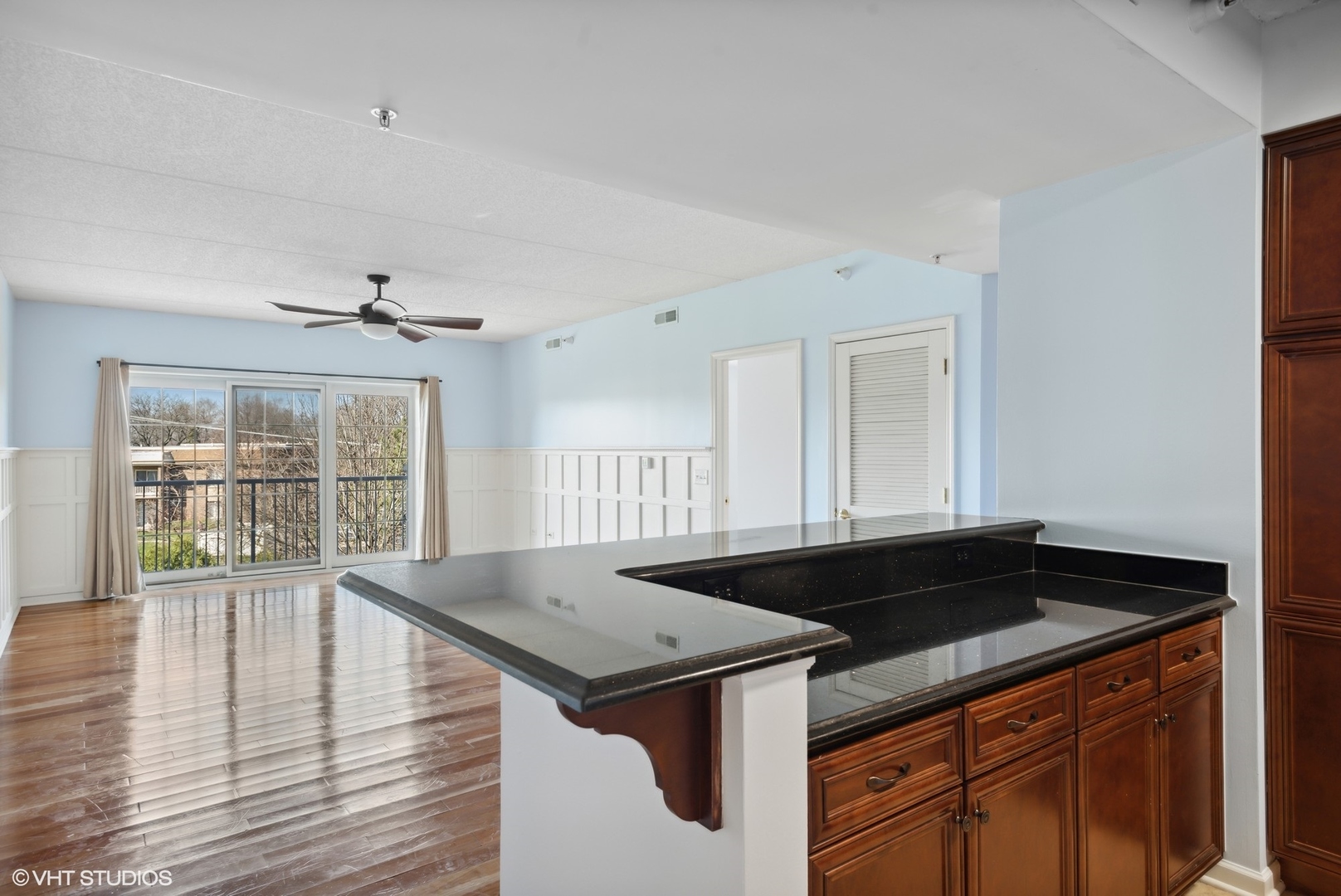 701 West Rand Road, Unit 330 Arlington Heights, IL 60004 - Photo 4 of 16 a kitchen with a sink and large window