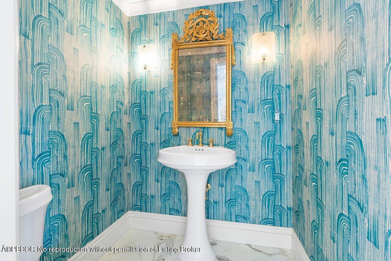 168 Kings Road Palm Beach, FL 33480 - Photo 14 of 51 a bathroom with a sink a toilet and shower