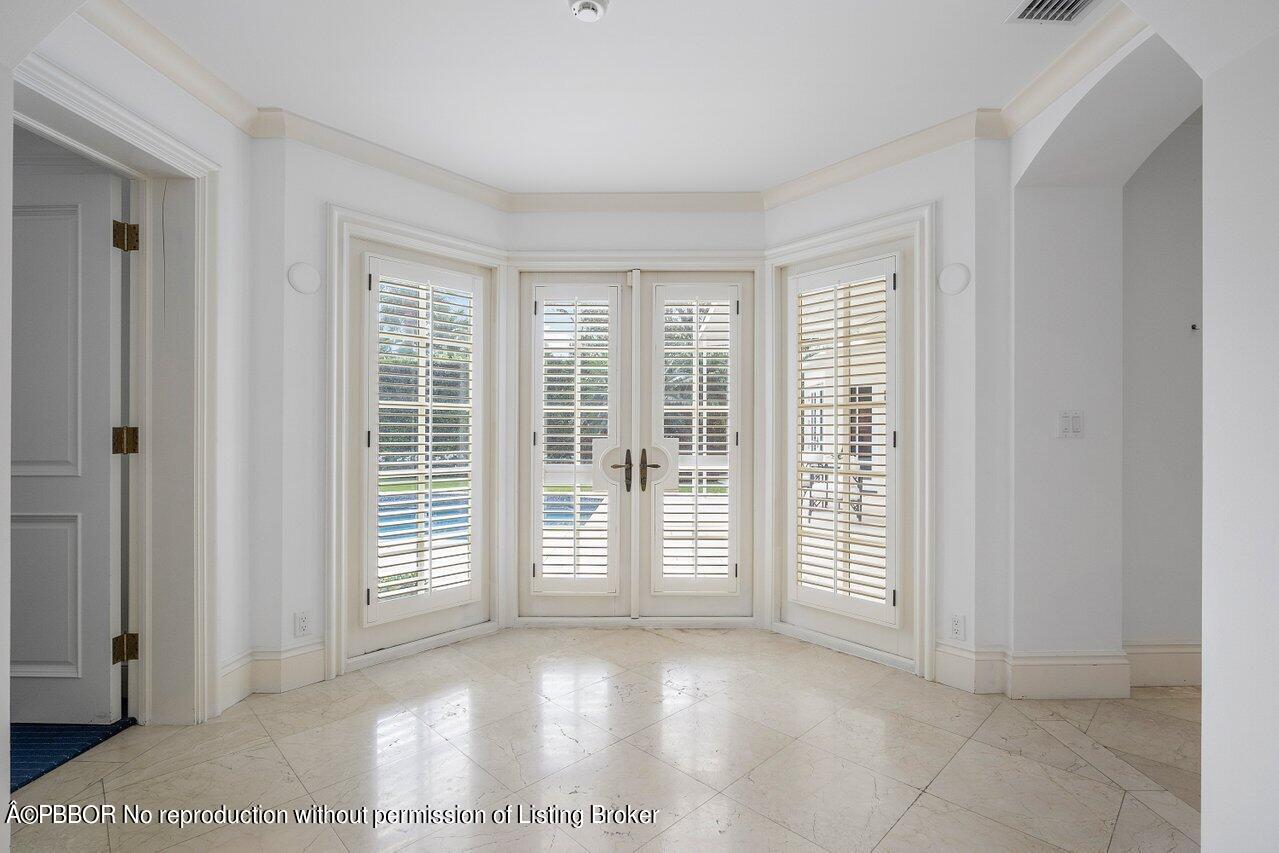 168 Kings Road Palm Beach, FL 33480 - Photo 20 of 51 a view of a room with a large window