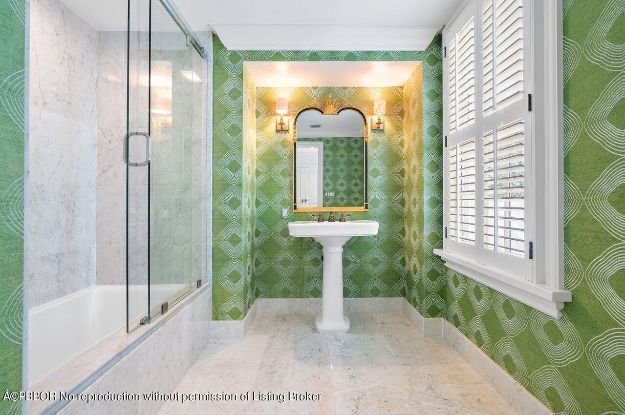 168 Kings Road Palm Beach, FL 33480 - Photo 39 of 51 a view of a bathroom with a shower and a bathtub