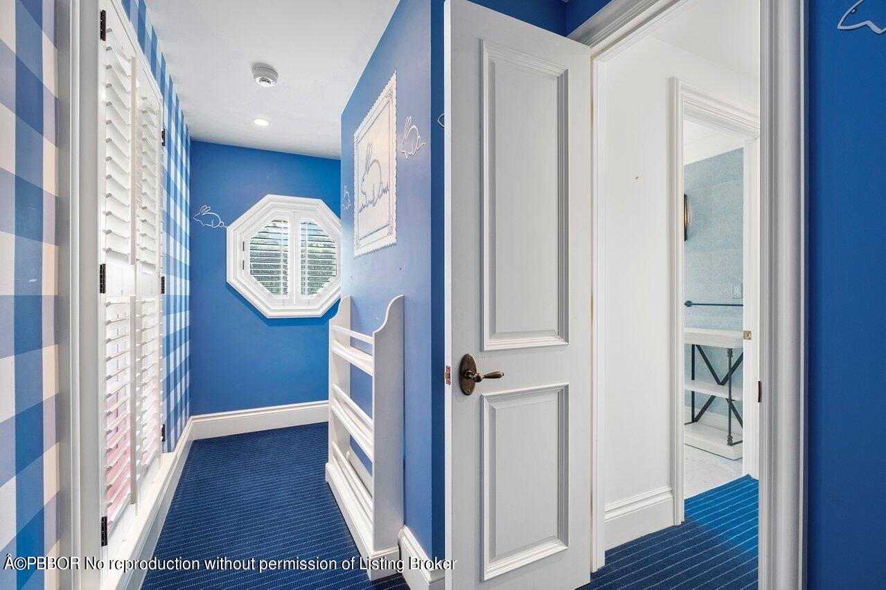168 Kings Road Palm Beach, FL 33480 - Photo 42 of 51 a view of hallway with wooden floor and stairs