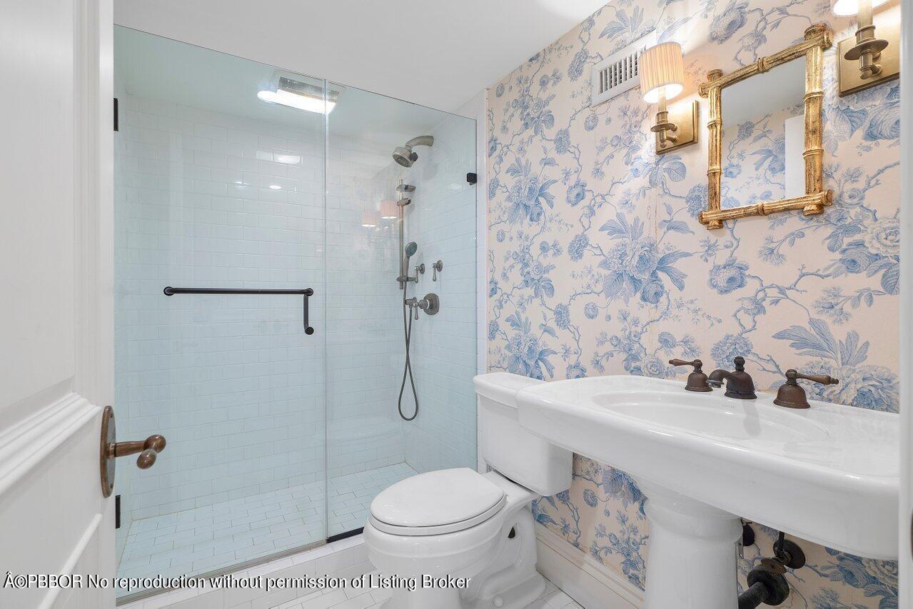 168 Kings Road Palm Beach, FL 33480 - Photo 44 of 51 a bathroom with a sink toilet and shower