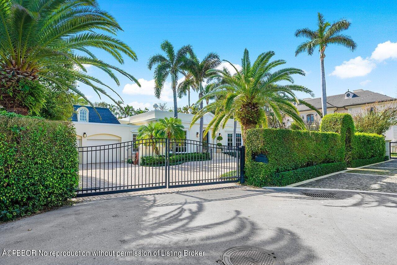 168 Kings Road Palm Beach, FL 33480 - Photo 50 of 51 a view of a palm trees front of a house