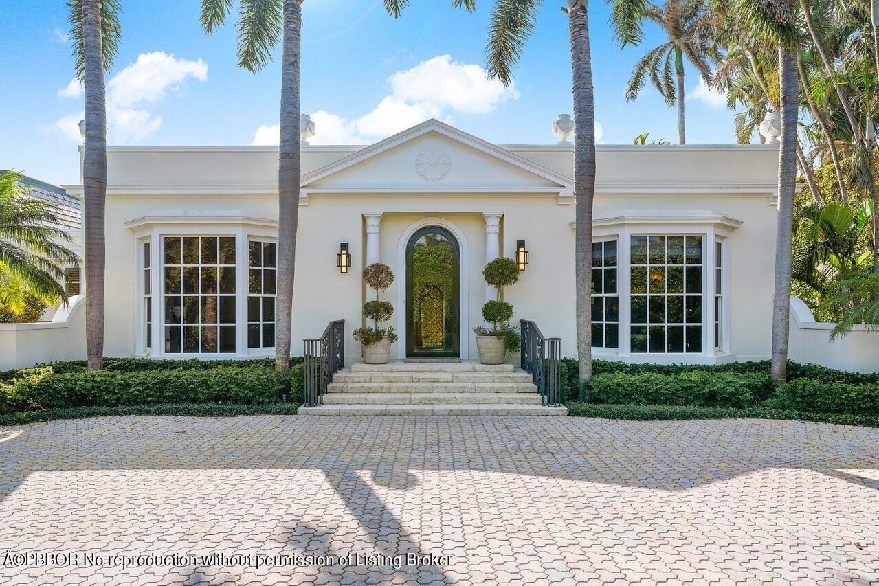 168 Kings Road Palm Beach, FL 33480 - Photo 5 of 51 a front view of a house with garden