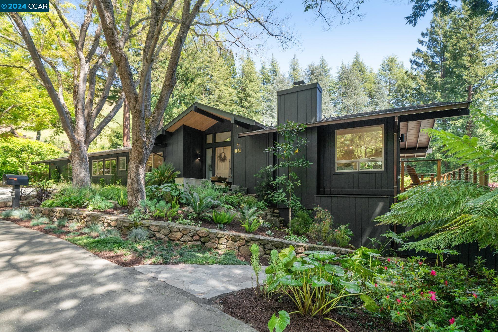 4034 Happy Valley Road Lafayette, CA 94549 - Photo 1 of 1 a front view of a house with a yard