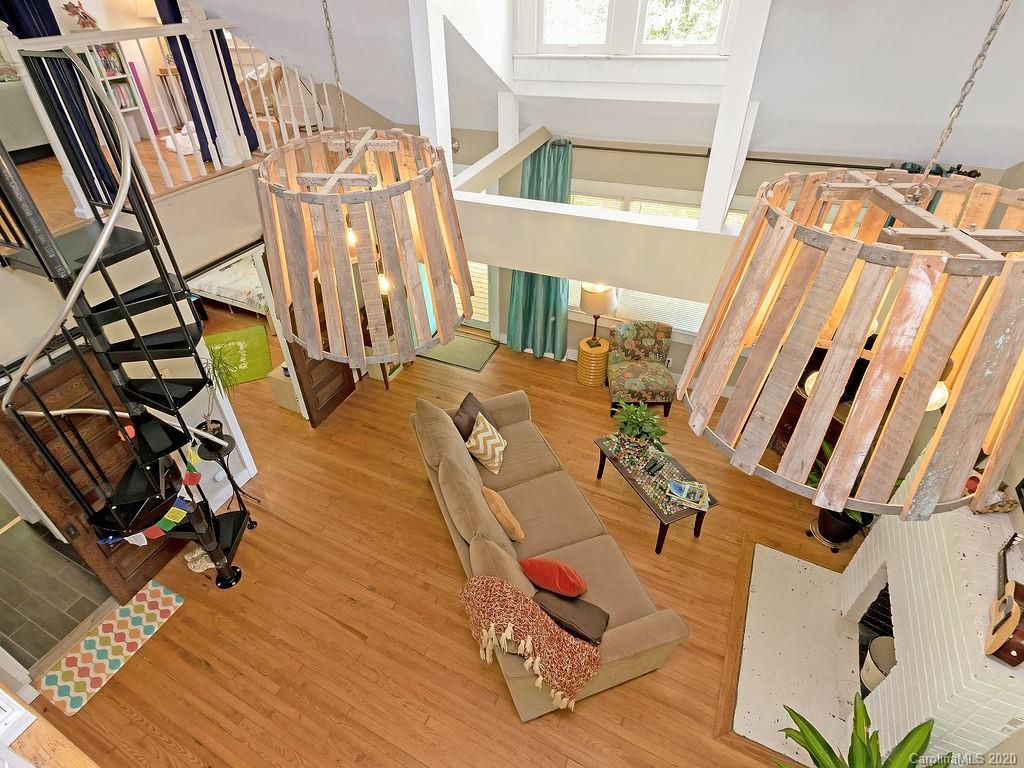 315 Shoals Falls Road Hendersonville, NC 28739 - Photo 17 of 47 a view of a living room with furniture and entryway
