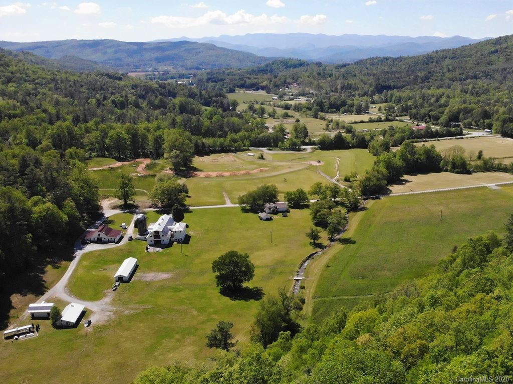 315 Shoals Falls Road Hendersonville, NC 28739 - Photo 47 of 47 a view of a lake with a mountain