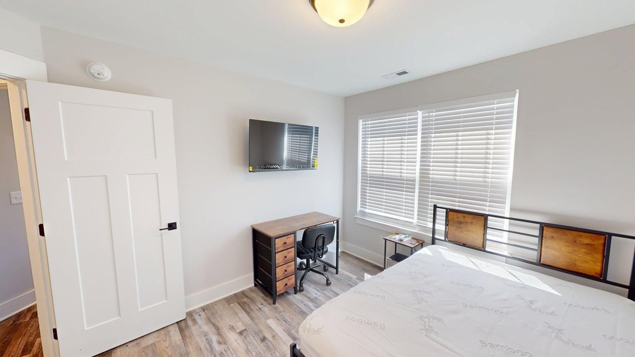 2315 Gold Valley Drive, Unit B1 Murfreesboro, TN 37130 - Photo 9 of 16 a bedroom with furniture and a window