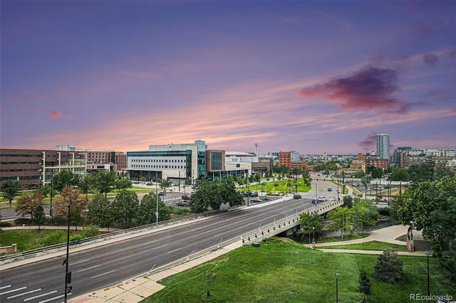a view of a city with a garden