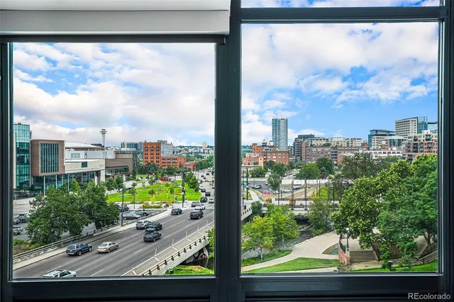a kitchen with cabinets and stainless steel appliances