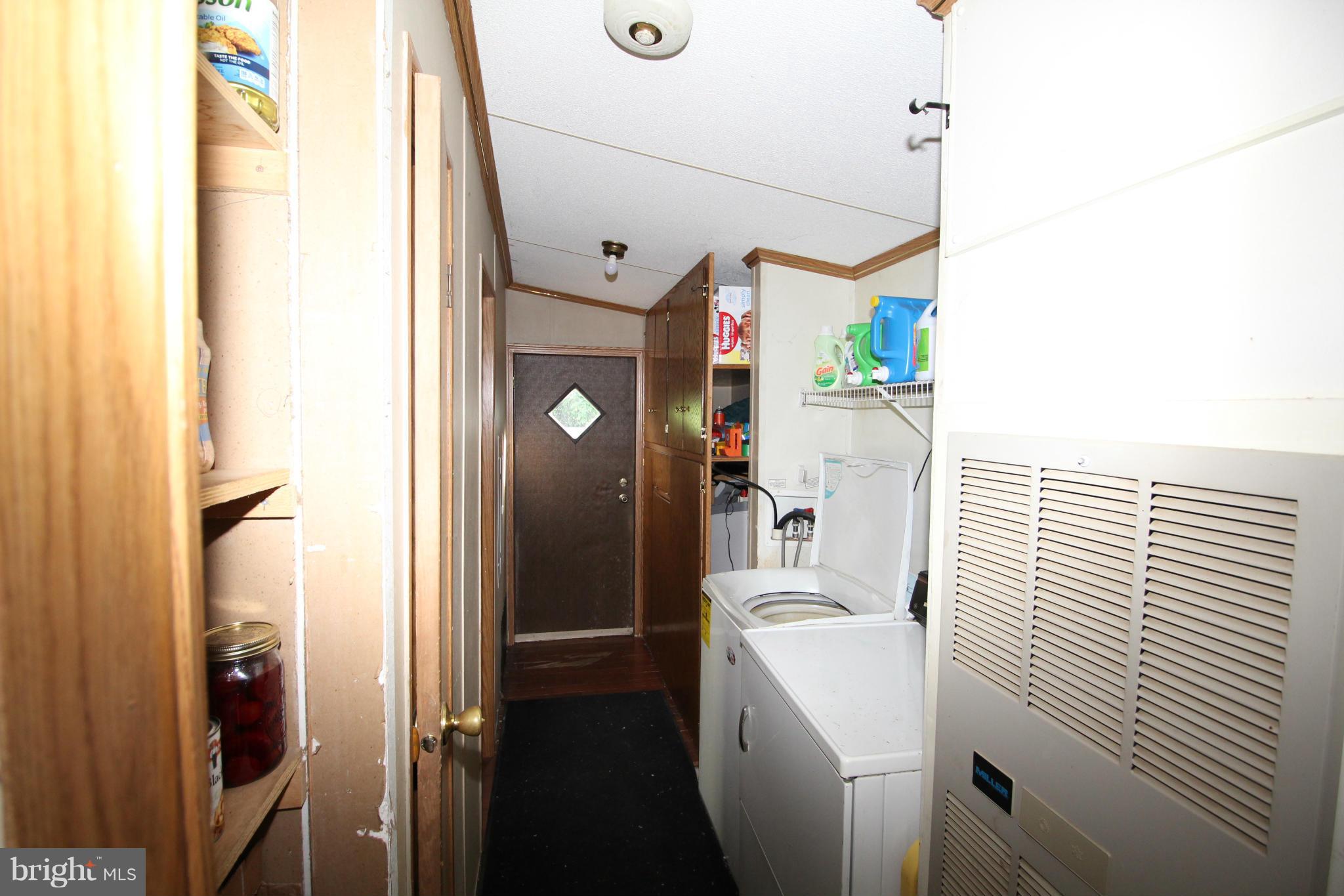 2178 Cecilton Warwick Road Warwick, MD 21912 - Photo 28 of 28 Hallway to the Deck, laundry is located there.