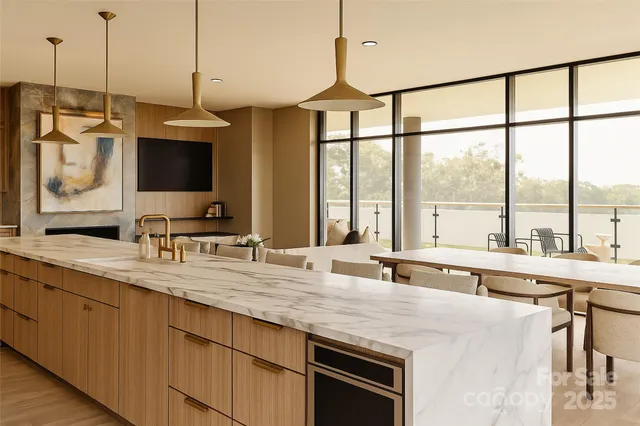 a kitchen with a large window and a sink