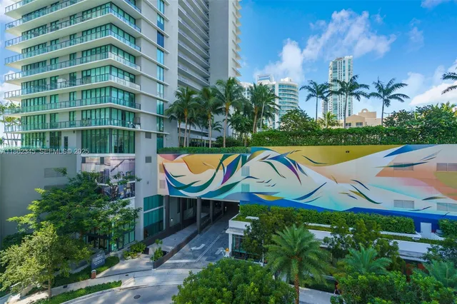 a view of a swimming pool and lounge chair