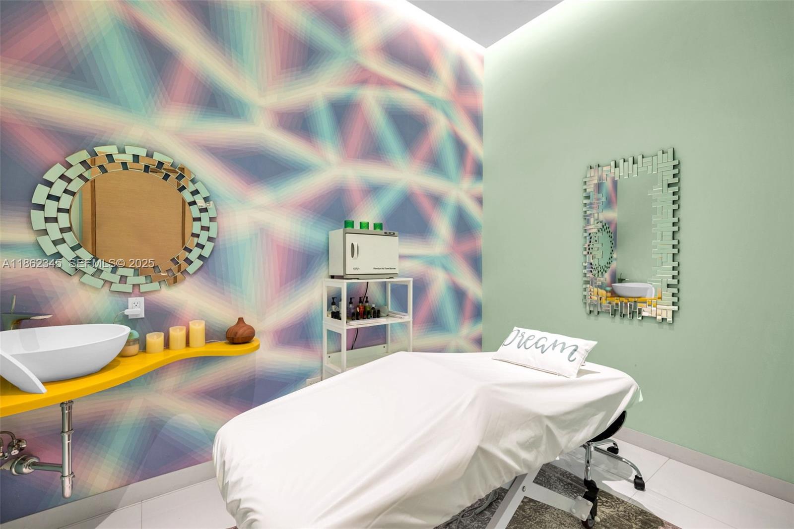 501 Northeast 31st Street, Unit 306 Miami, FL 33137 - Photo 59 of 65 a living room with furniture and a mirror