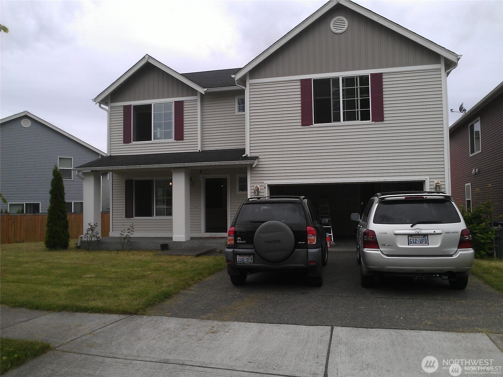 19114 14th Drive Southeast Bothell, WA 98012 - Photo 2 of 13 a car parked in front of a house