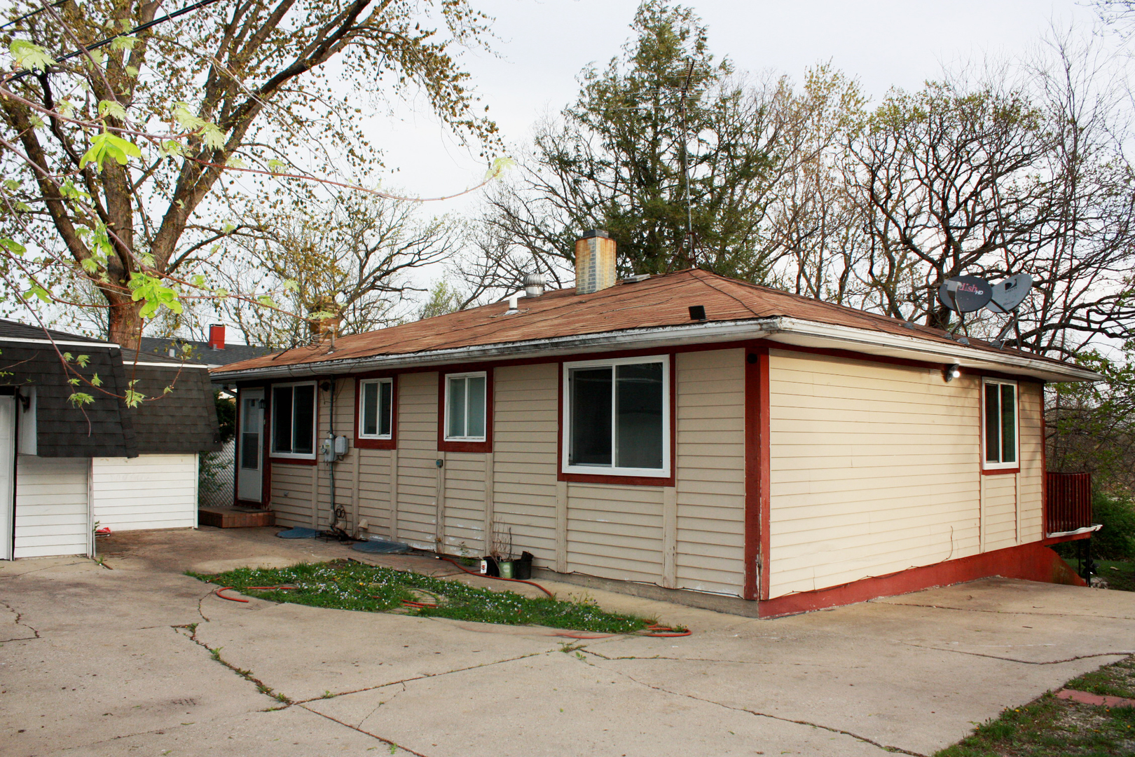 115 Kings Road Carpentersville, IL 60110 - Photo 16 of 16 a front view of a house with garage