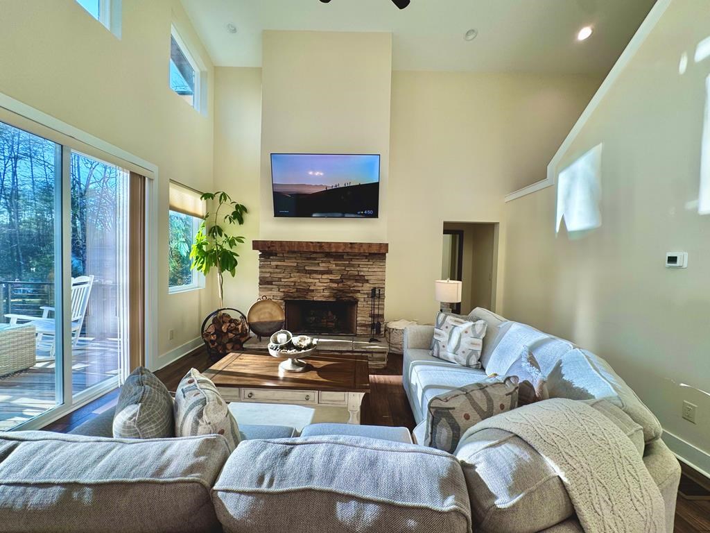 939 Sunset Road Epworth, GA 30541 - Photo 7 of 30 a living room with furniture and a fireplace