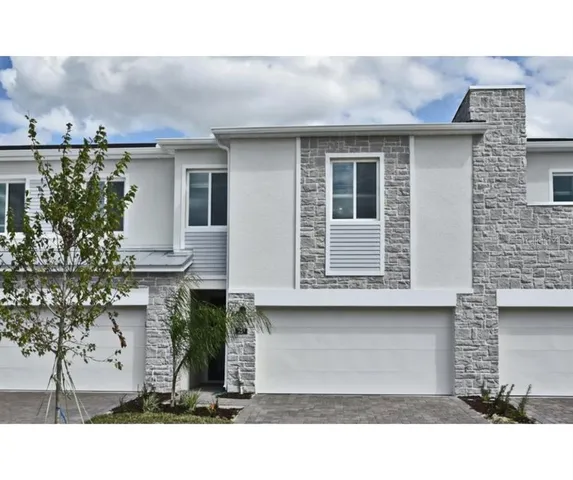 a black and white photo of a house